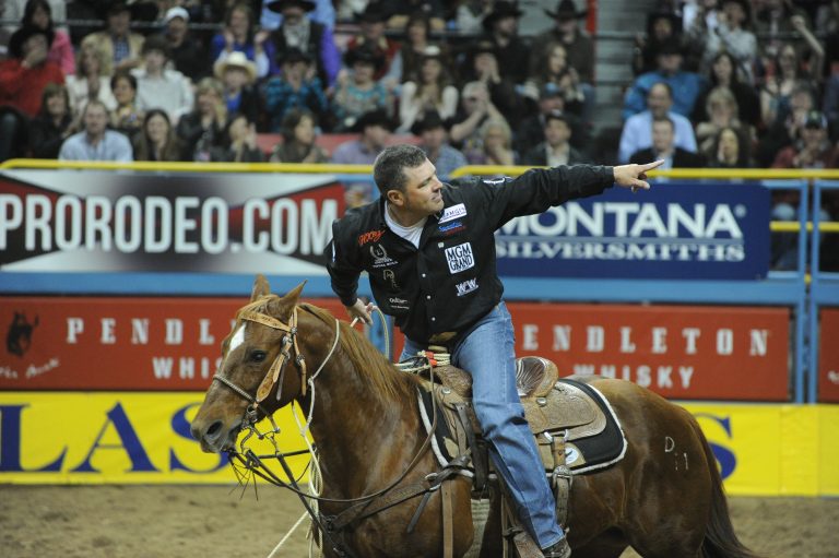 Cody Ohl calf roping at the National Finals Rodeo