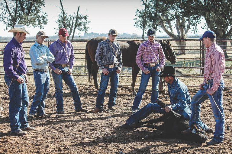 Calf roper Stran Smith teaching a clinic to young ropers