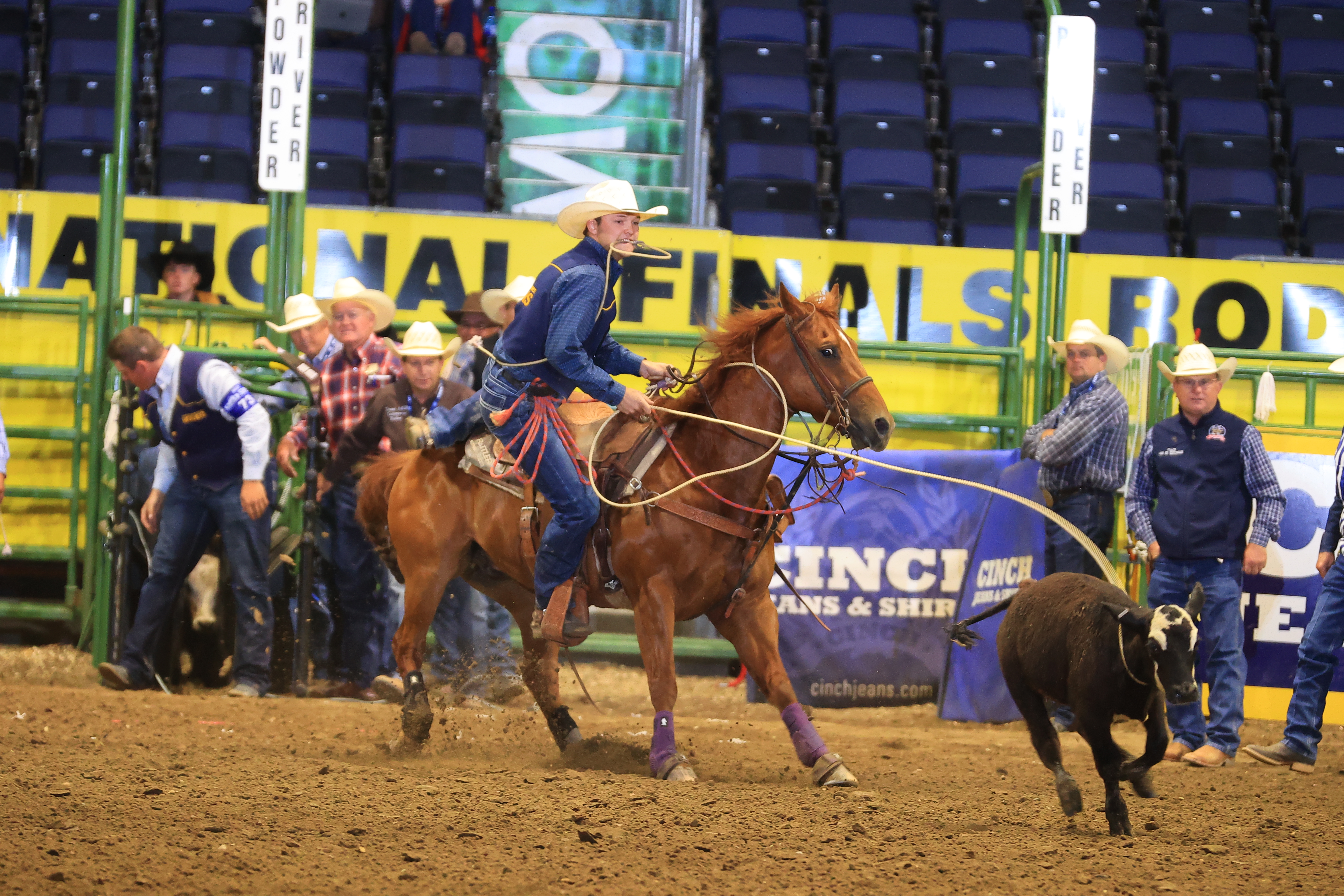 Kincade Henry roping his first-round calf at the 2023 CNFR.