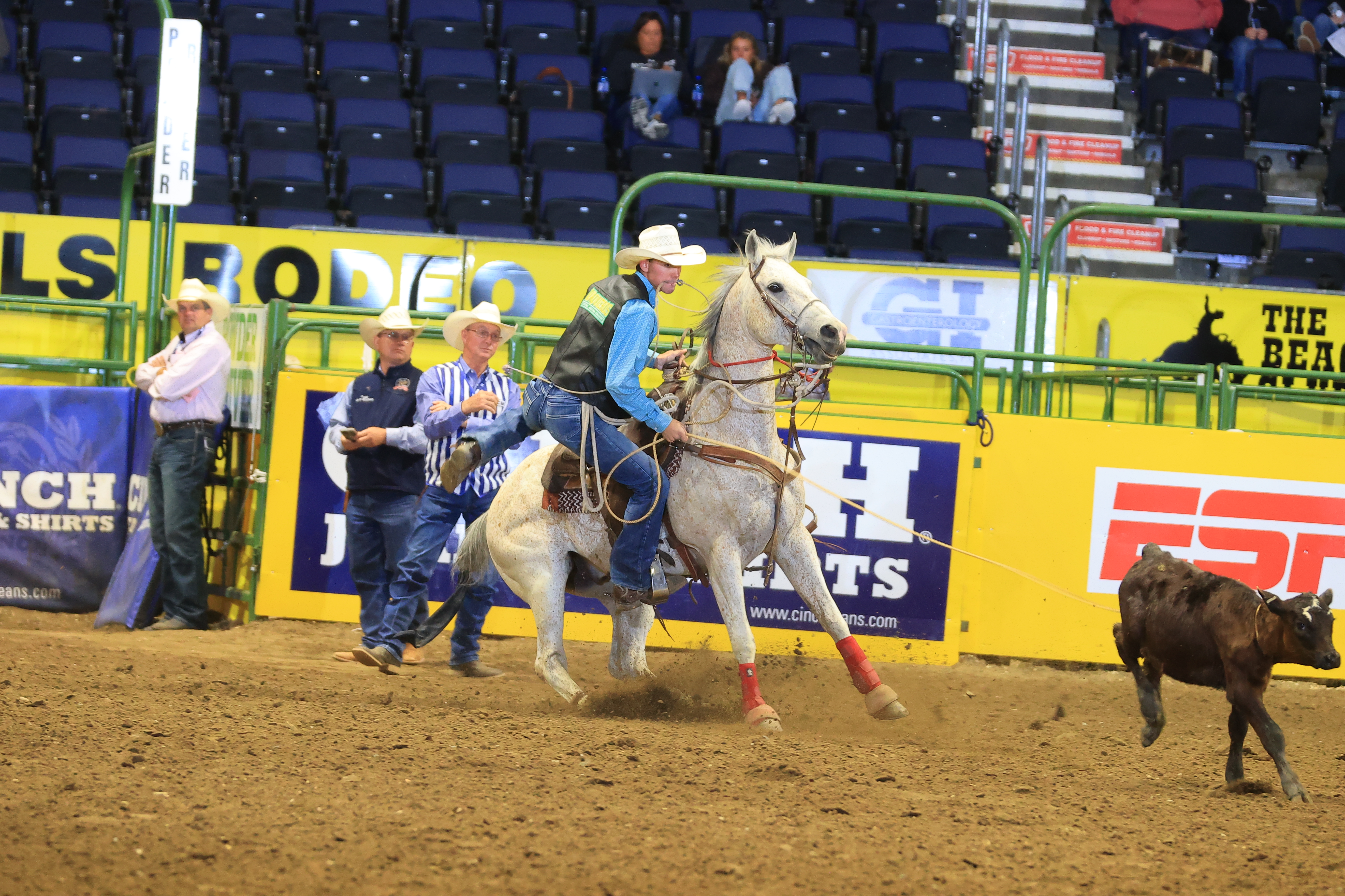 Kass Newman roping his calf in the second round of the 2023 CNFR.