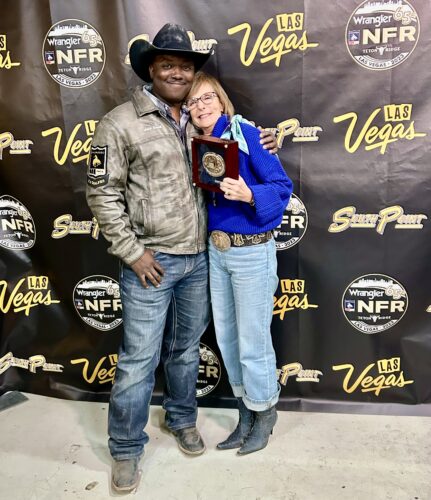John and Jenna with Round 1 buckle.