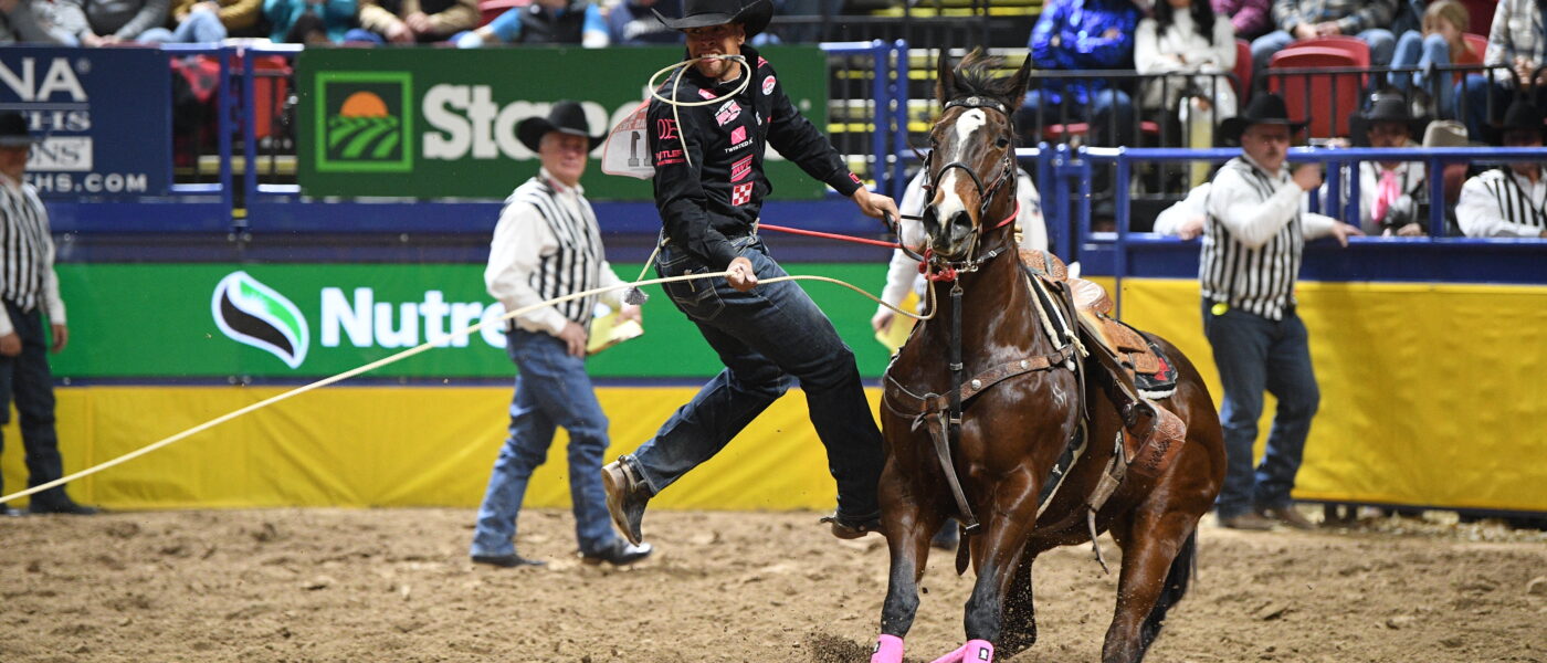 Shad Mayfield dismounts from mare "Lollipop" in Round 4.