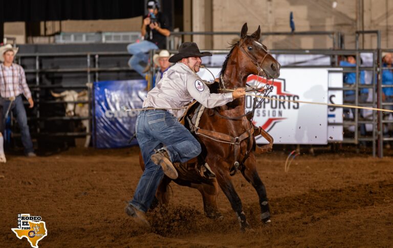 Westyn Hughes dismounts on his way to tie his calf at the 2024 El Paso Rodeo.