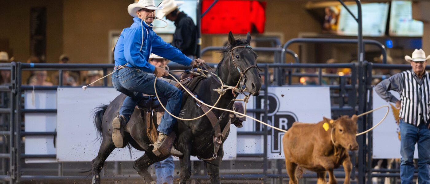 Bodie Mattson stepping off his horse to win the 2024 NFR Open.